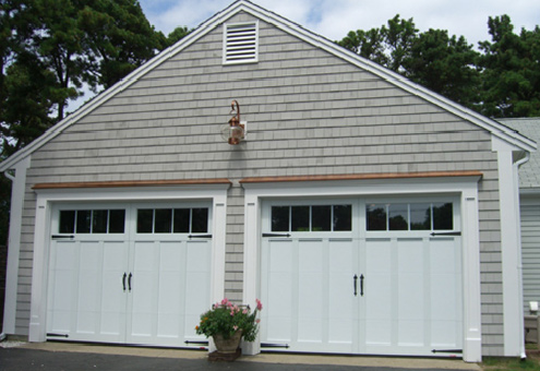 You can also get some great effects by positioning new garage door windows vertically.