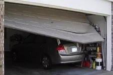 Just Backed into Your Garage Door? Here’s What You Should Do